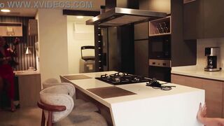 Cougar seduces her niece's boyfriend while she works in the living room.